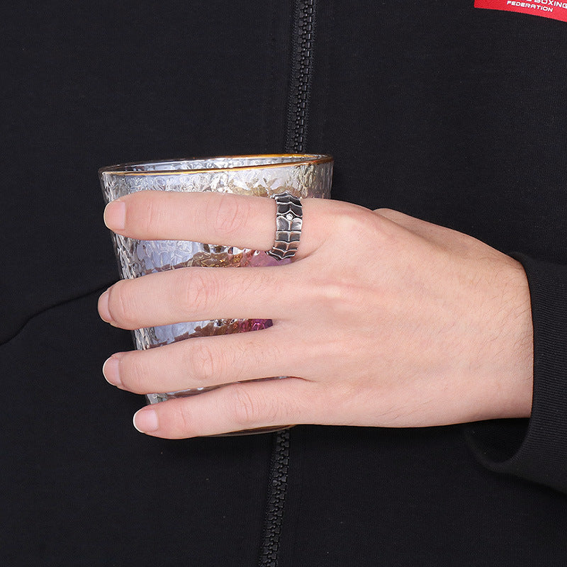 Distressed, minimalist, and stylish dragon-shaped diamond ring