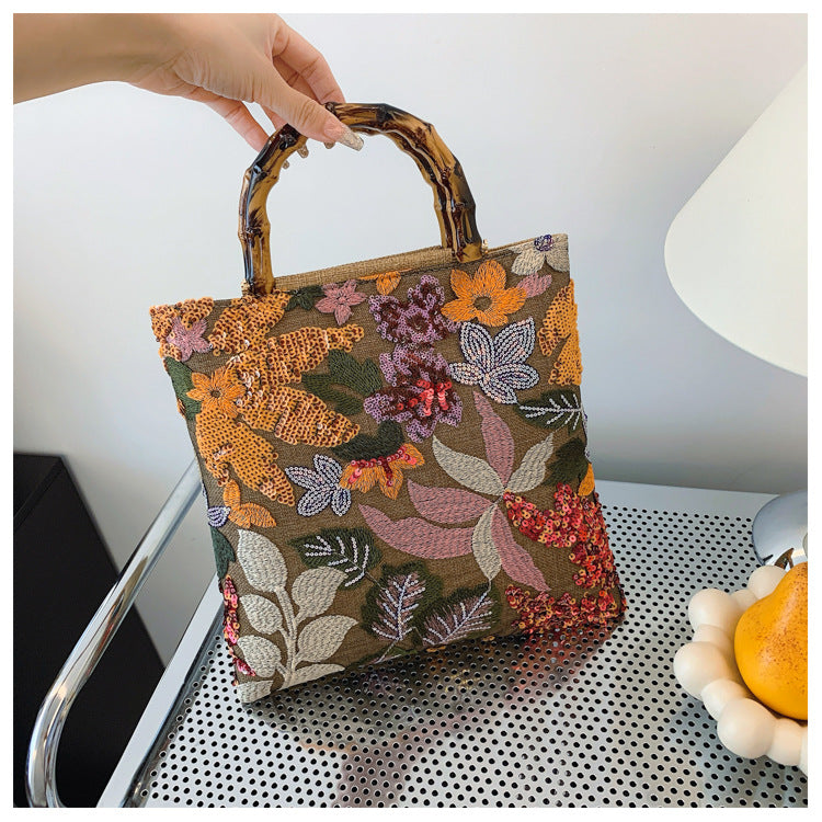 Embroidered sequins linen bamboo handle tote bag