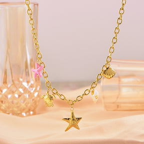 starfish turtle conch gold necklace