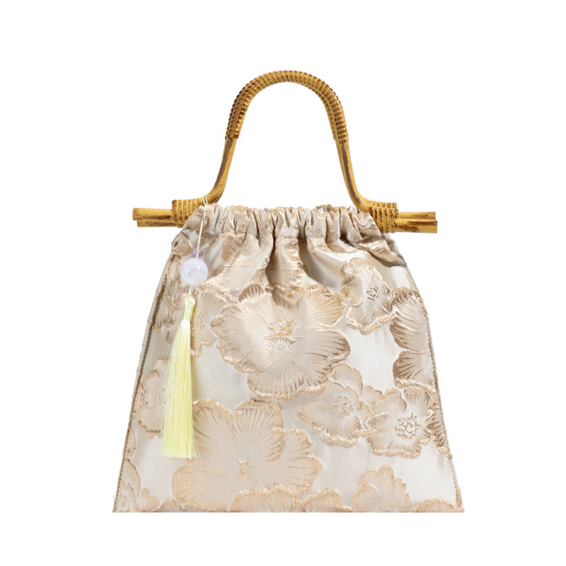 Embroidered sequins linen bamboo handle tote bag