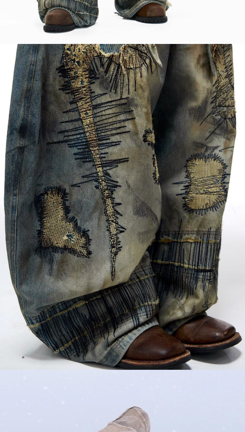 "Random Stitch" Embroidered & Distressed "Scythe" Cut Denim Jeans
