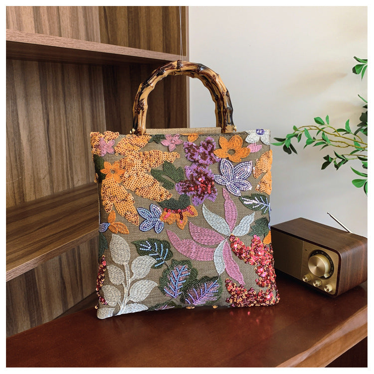 Embroidered sequins linen bamboo handle tote bag