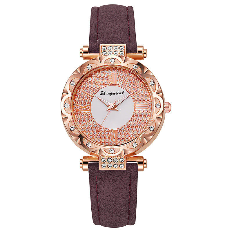 Korean-style quartz watch with a simple leather strap.