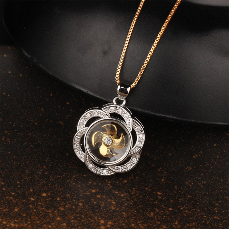 Collana con ciondolo a forma di mulino a vento girevole AAA Cubic Zirconia Pavimenta gioielli in cristallo color argento color oro